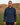 Cadence Windshirt in navy, worn on the course