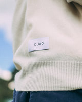 Merino Haven Hoodie label and knit detail in cream