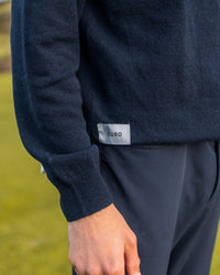 Merino Haven Hoodie knit and hem label detail in navy