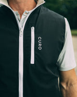 Revere Reversible Gilet in black, chest pocket detail