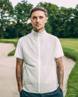 Revere Reversible Gilet in grey, worn by a bunker